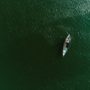 A boat drifting on a river